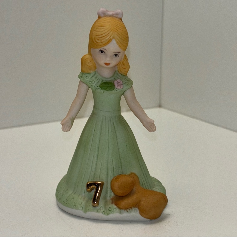 Enesco 1981 bisque porcelain “Growing Up Birthday Girls” age 7 figurine.